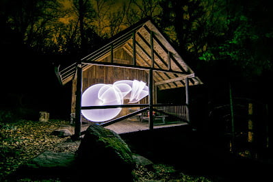 light painting at a cabin using slow shutter speed on my camera
